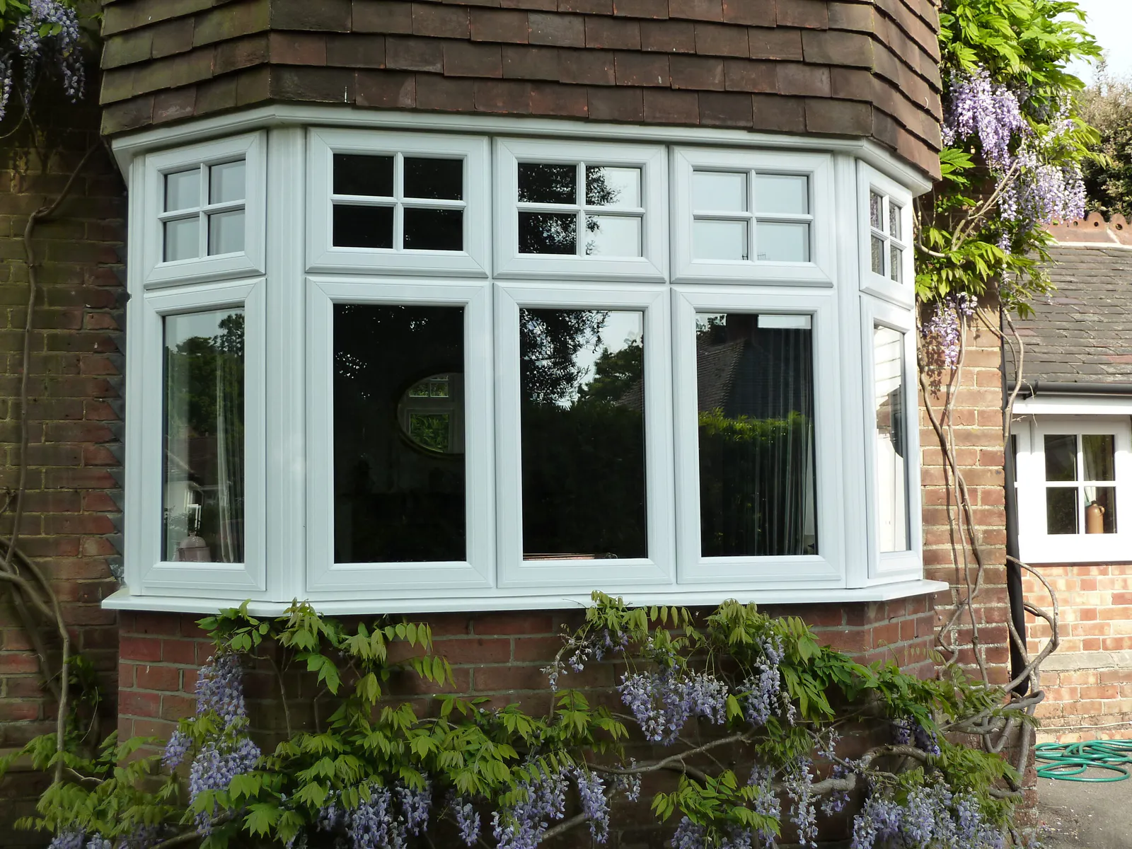 Grey uPVC casement window exterior